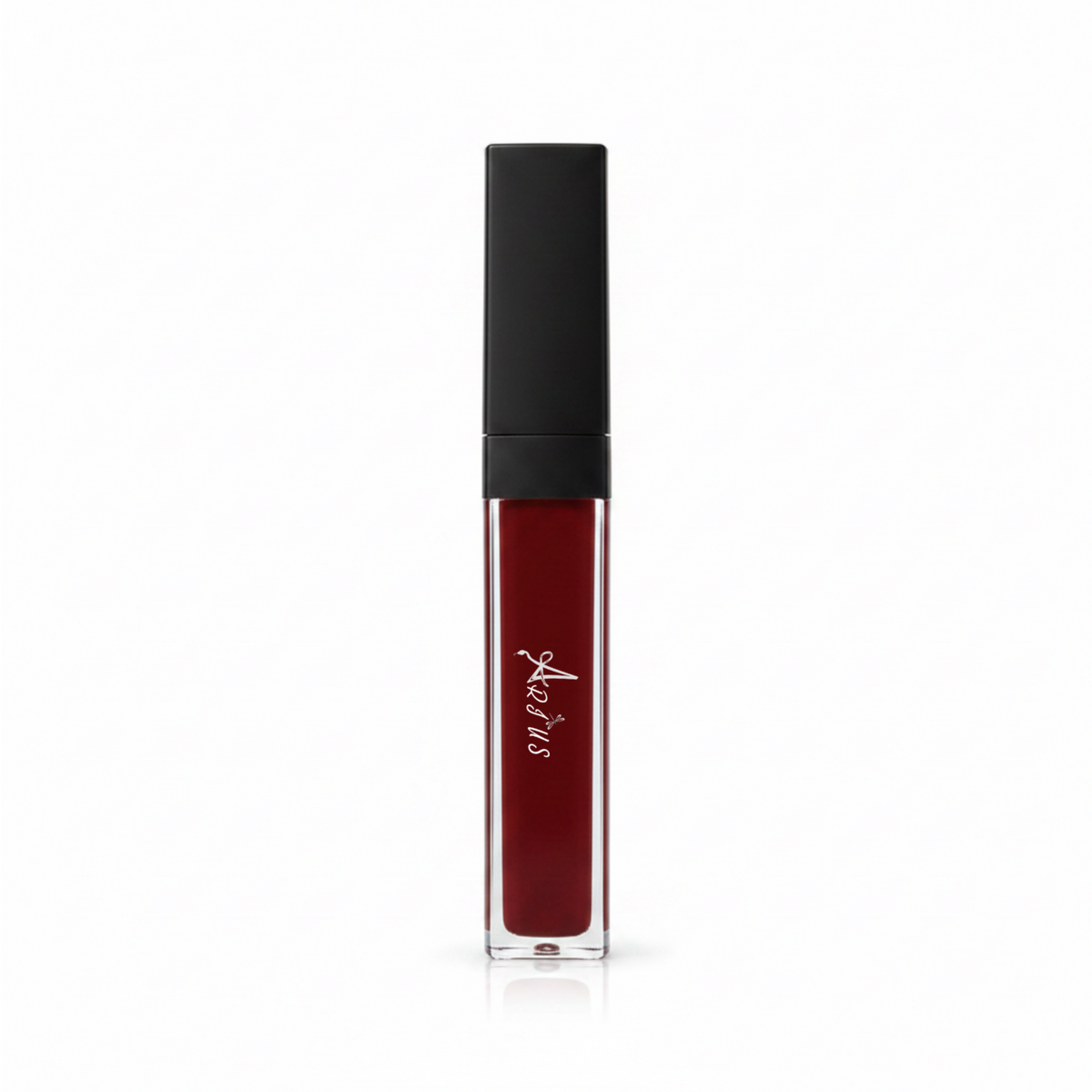 A clear rectangular tube of liquid lipstick with deep burgundy red liquid inside and a matte black cap, featuring a white script logo on the front, set against a plain white background.